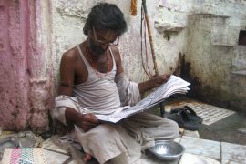 people_read_news_paper_madras_courier